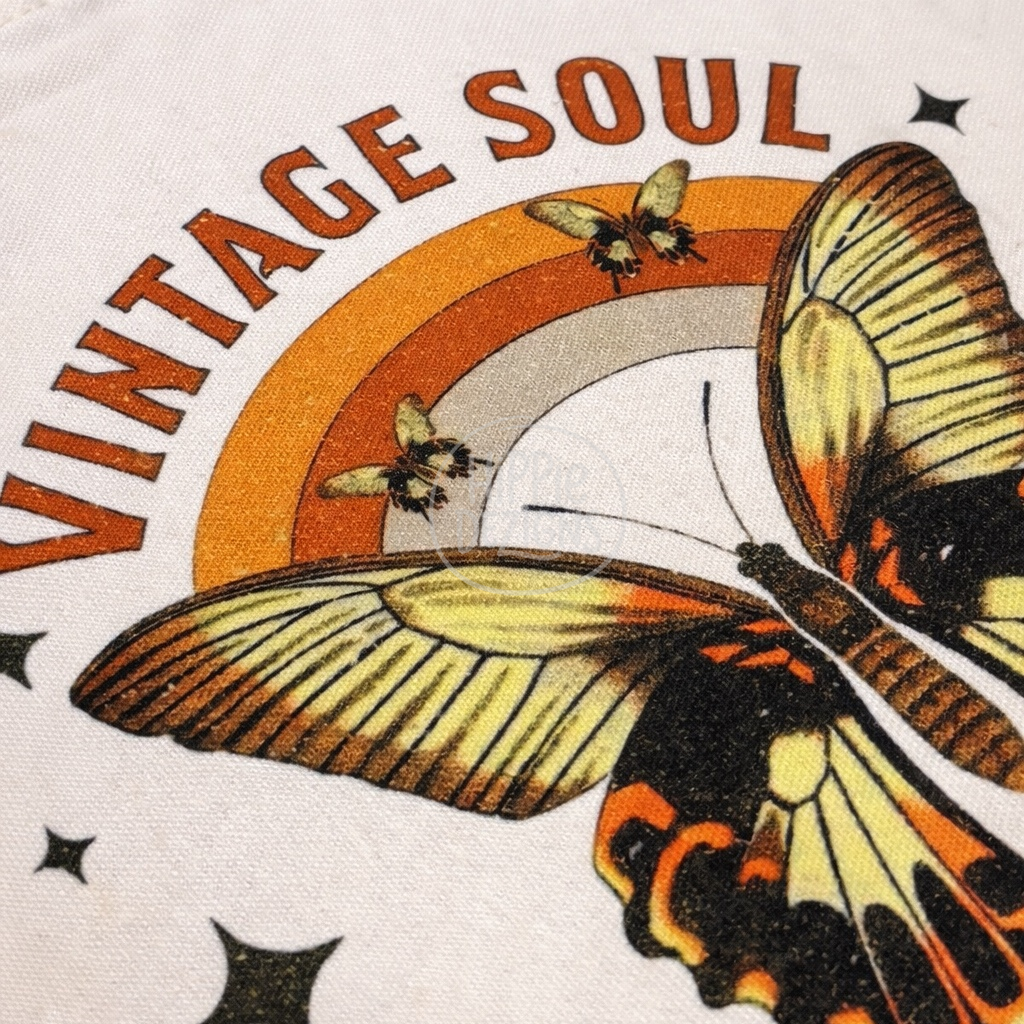 Butterfly design with 'Vintage Soul' text on a white background