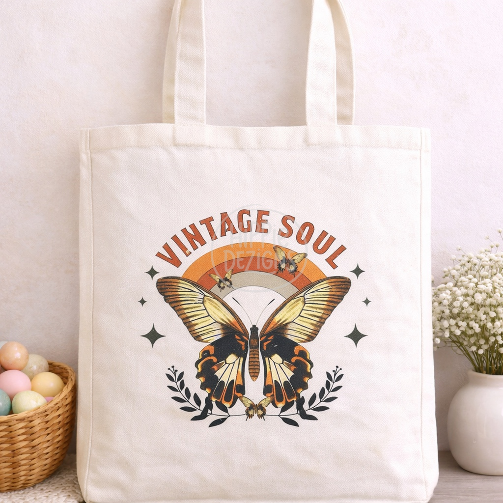 Tote bag with butterfly design and 'Vintage Soul' text on a light background
